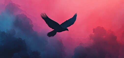 Fototapeta premium Silhouette of an eagle soaring against a vibrant, colorful sky.