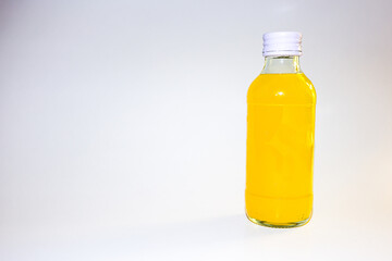 Orange juice bottle. Organic orange or lemon juice in plastic or glass bottle.