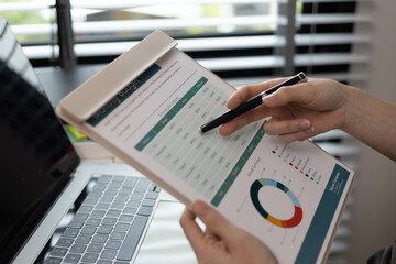 The executives are reviewing the information in the important documents