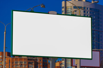 billboard along the highway on a winter snow day. Background for design and advertising. 
