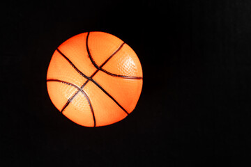 Orange Basketball on Black Surface