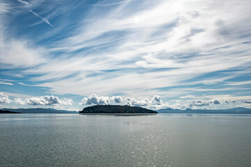 Scenic view of Isola Maggiore on Trasimeno lake against the sky, view from Tuoro sul Trasimeno, Umbria, Italy
