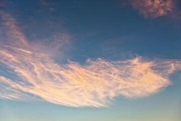A sky with beautiful, soft pink clouds.