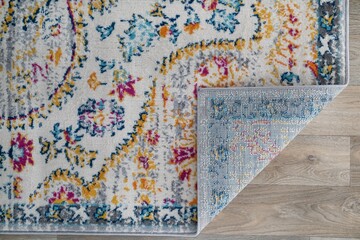 Square corner fold of a specially designed carpet