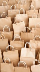 Fototapeta premium Versatile kraft shopping bags in various sizes with twill handles for stylish carrying of goods anywhere