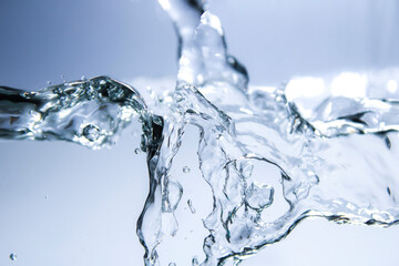 Image of water waves and blue bubbles.