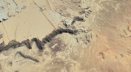 The landscape of the sandy desert in Qatar from a bird's eye view