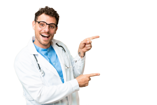 Brazilian doctor man over isolated chroma key background surprised and pointing side