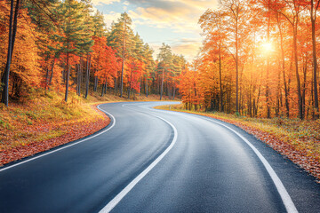 Fototapeta premium A road with a curve and trees in the background