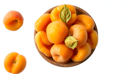 Bowl of dried apricots isolated on transparent background, top view isolated with white highlights, png