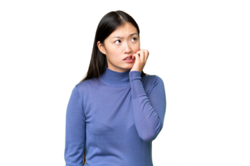 Young Asian woman over isolated chroma key background is a little bit nervous