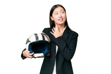 Young Asian woman with a motorcycle helmet over isolated chroma key background looking up while smiling