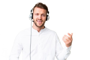 Telemarketer caucasian man working with a headset over isolated chroma key background making guitar gesture