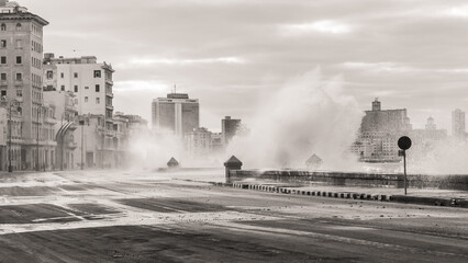 Malecon, Cuba skyline and waves crashing in black and white.  © Katie Dobies