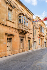 Fototapeta premium Street view in Xaghra, one of the largest towns in Gozo. Malta