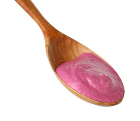 Tasty beetroot hummus in wooden spoon isolated on white