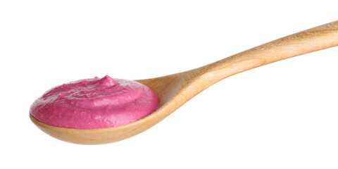 Tasty beetroot hummus in wooden spoon isolated on white