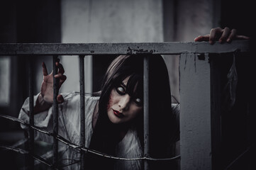 Portrait of asian woman make up ghost,Scary horror scene for background,Halloween festival...