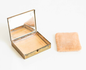 Open Vintage Powder Box with Stained Mirror and Powder Puff Sponge – Isolated on White Background