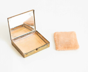 Open Vintage Powder Box with Stained Mirror and Powder Puff Sponge – Isolated on White Background