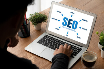 SEO search engine optimization for modish e-commerce and online retail business showing on computer...