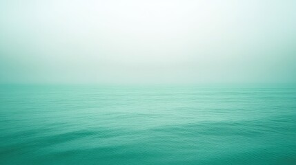 Obraz premium Soft sea green background with a delicate gradient, providing a calming and refreshing appearance