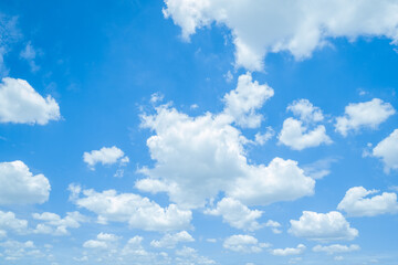 Soft White Clouds in a Vibrant Blue Sky - Ideal for Nature Background