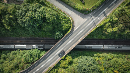 Aerial view of road and rail track in East Sussex, close to Brighton, UK