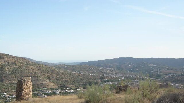 Rests of a ancient fortress at sunset, Alcaucin, Spain