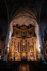 the interior of a church with a large altar .Puente La Reina, Navarra, Spain