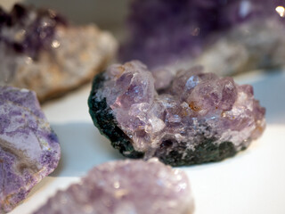 Several pieces of amethyst, close up. Symbol of royalty and a birthstone of February