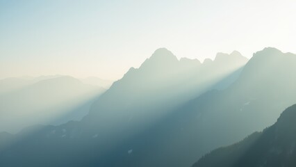 Obraz premium Serene Mountain View with Soft Light and Misty Atmosphere