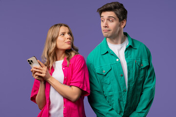 Suspicious man Spying On girlfriend Chats With Smartphone. Jealousy, Curiosity