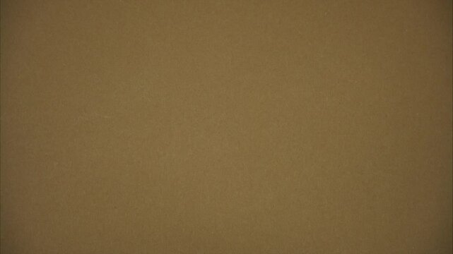 Euro banknotes of different nominal value on braun background. The concept of investment. Stop motion animation