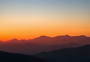Obraz premium Majestic Sunrise Over Mountain Range