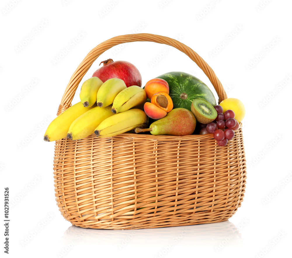 Canvas Prints Many different fresh fruits in wicker basket isolated on white