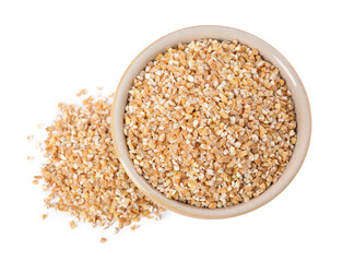 Dry wheat groats in bowl isolated on white, top view