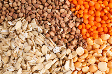 Different cereal grains as background, top view