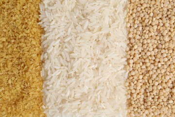 Different types of cereals as background, top view