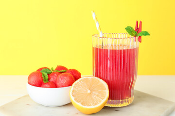 Tasty watermelon drink in glass and fresh fruits on white table, closeup