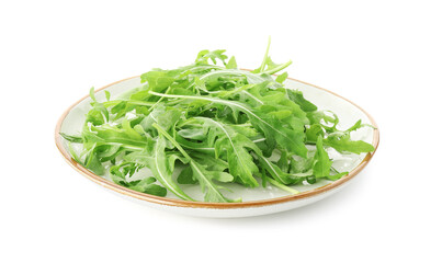 Plate with fresh arugula leaves isolated on white