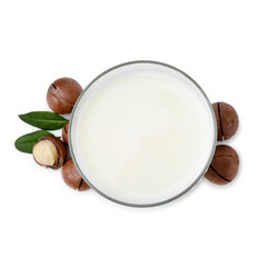 Glass of macadamia milk and nuts isolated on white, top view