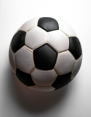 A close-up of a modern soccer ball, isolated on a white background