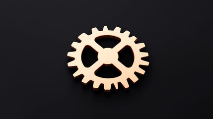A single gold gear rests against a black background, symbolizing teamwork and progress.