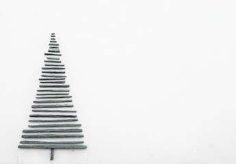 Fototapeta premium Minimalist Christmas Tree Illustration Made of Simple Geometric Shapes on a White Background, Featuring a Clean Design and Vibrant Green Color for a Modern Holiday Look.
