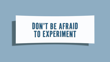Don’t be afraid to experiment. A card isolated on blue background.