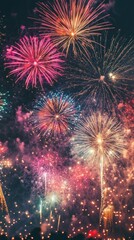Vibrant display of colorful fireworks in a night sky, bursting with bright colors. Ideal for New Year's Eve celebrations.