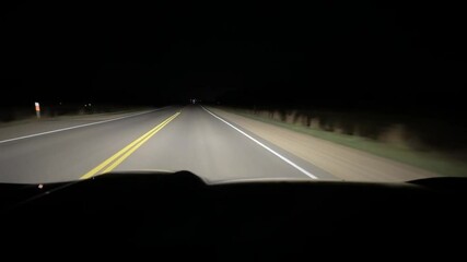 Night highway. View through the windshield