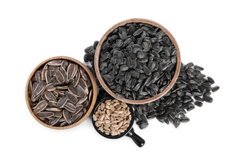Sunflower seeds in bowls isolated on white, top view