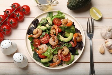 Delicious shrimp salad and ingredients on white wooden table, flat lay